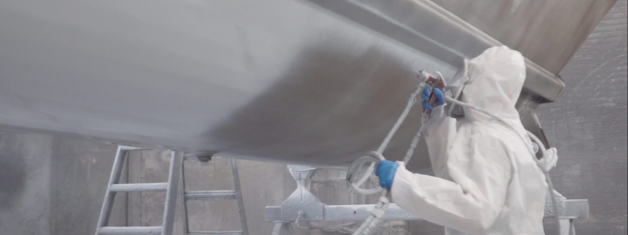 Painting smithco side dump trailer 2